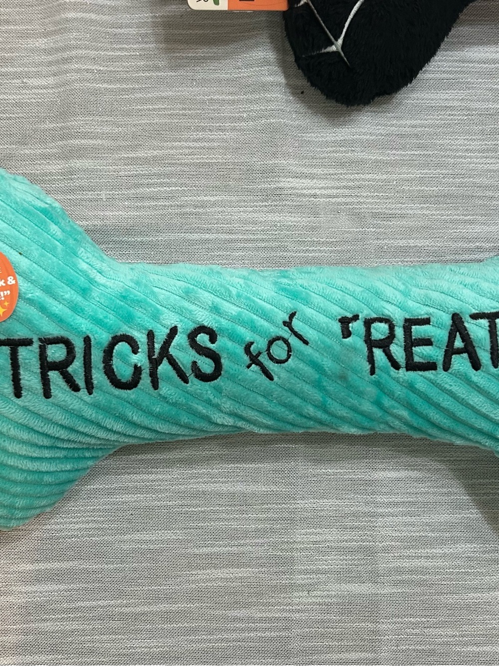 Kong Teal Plush Bone Toy with Embroidered 'Tricks for Treats'
